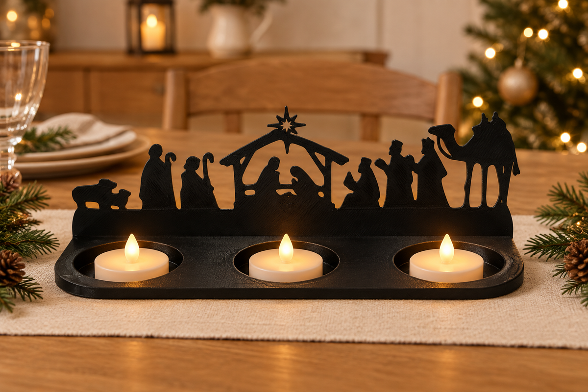 Nativity scene tealight holder on an oak dining table with a linen runner.