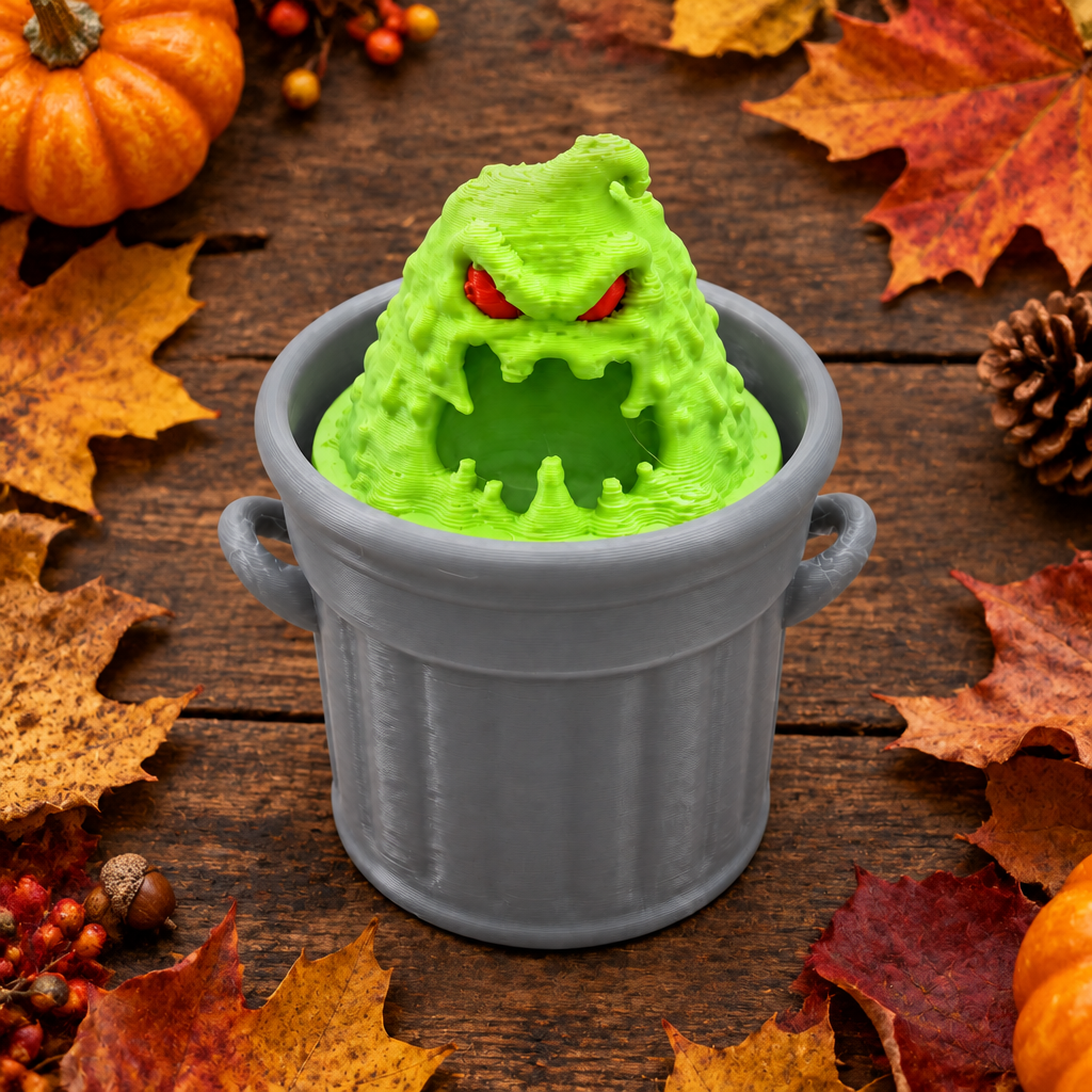 Overhead Trash Slime Monster Clicker on autumn table