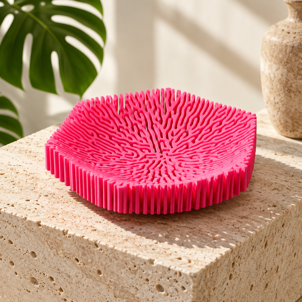 Coral bowl on travertine plinth