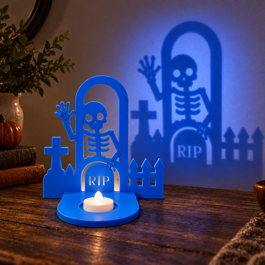 Graveyard shadow lamp with LED tea light on wooden tabletop