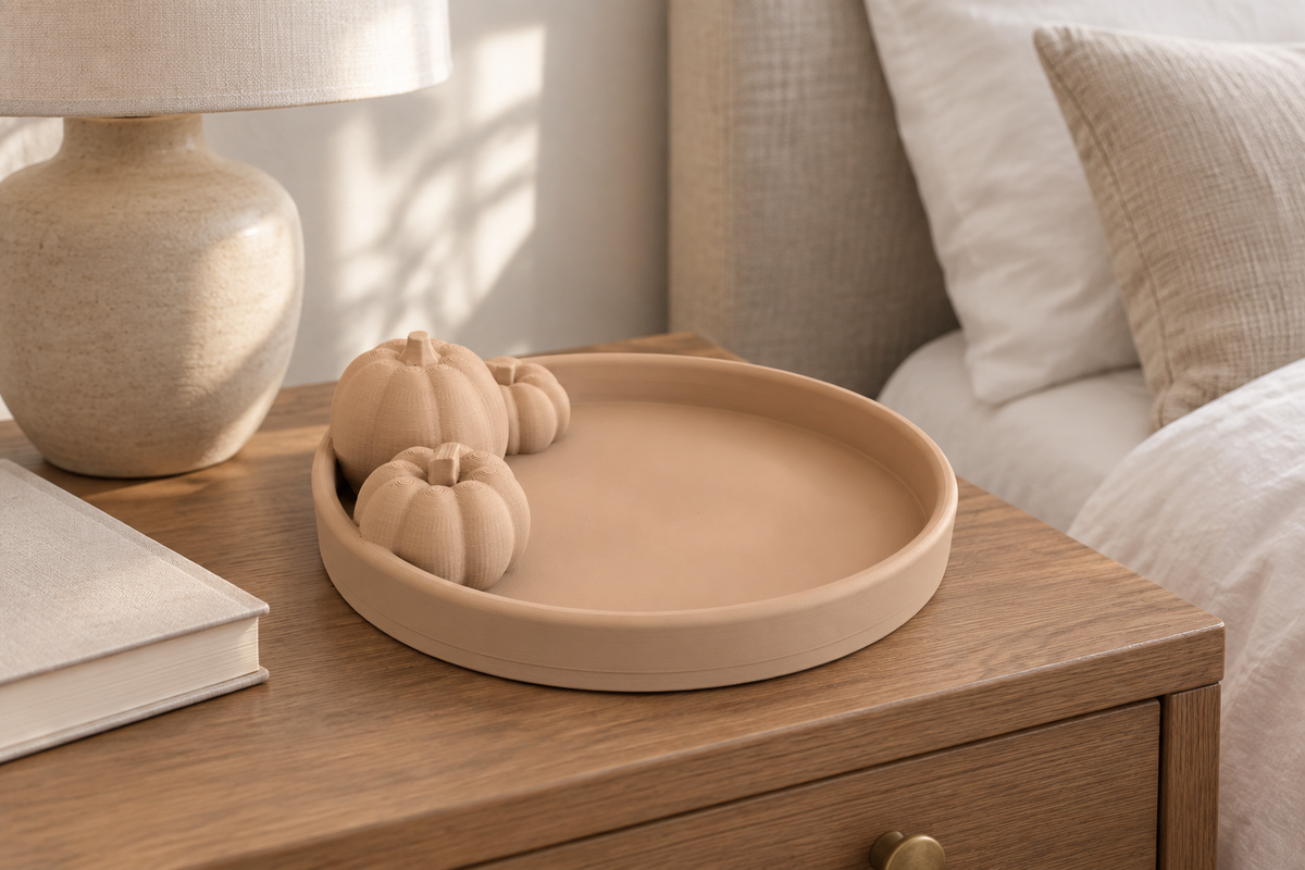 Beige Pumpkin Tray displayed on a neutral bedside table