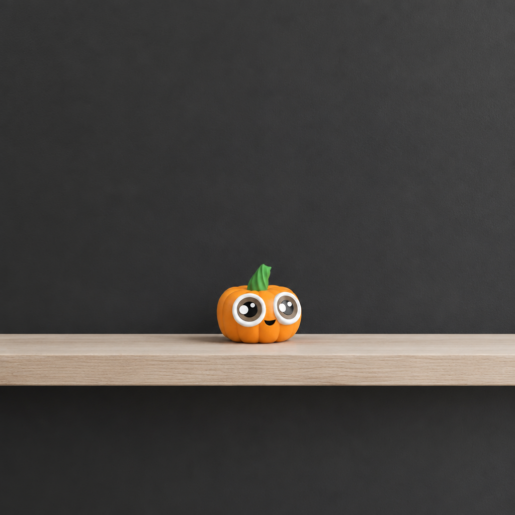 Small pumpkin figure on a wide shelf with plenty of space around it
