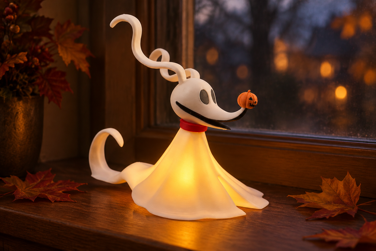 White ghost dog tealight holder glowing by an autumn window with curled ears and tail