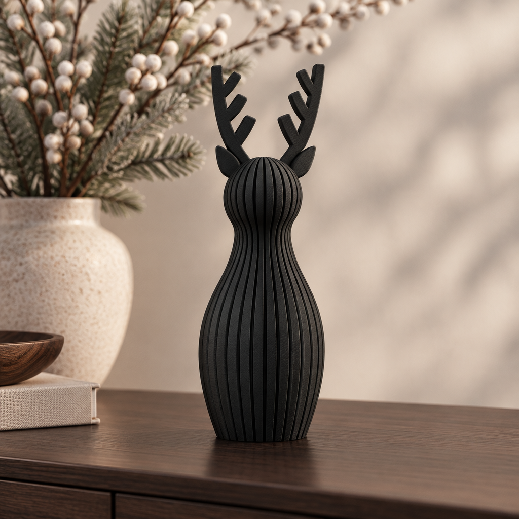 A single black ribbed Christmas reindeer ornament on a modern dark wood sideboard