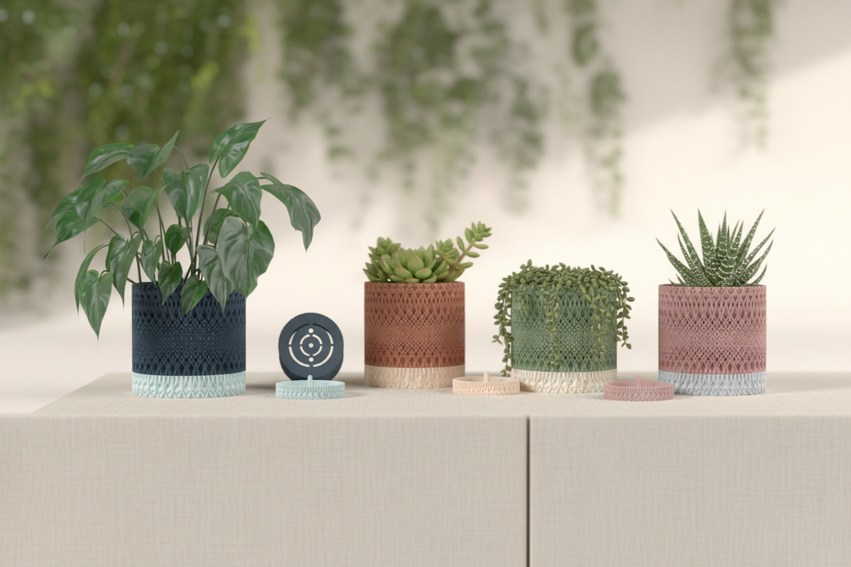 Four Geometric Textured Plant Pots navy terracotta sage green dusty pink two-tone diamond lattice each holding small houseplant pale linen sideboard cream wall wide editorial