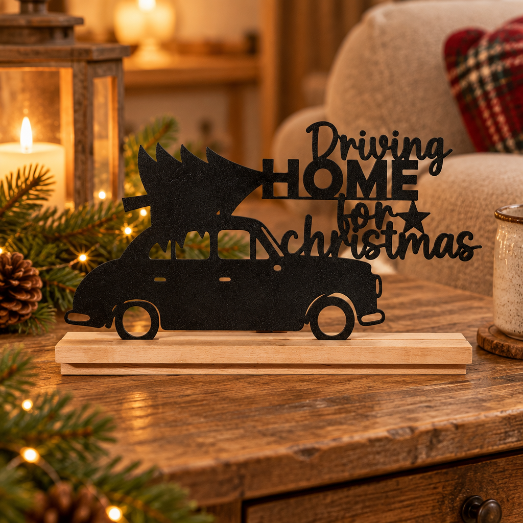 Driving Home for Christmas car silhouette sign on a rustic wooden side table