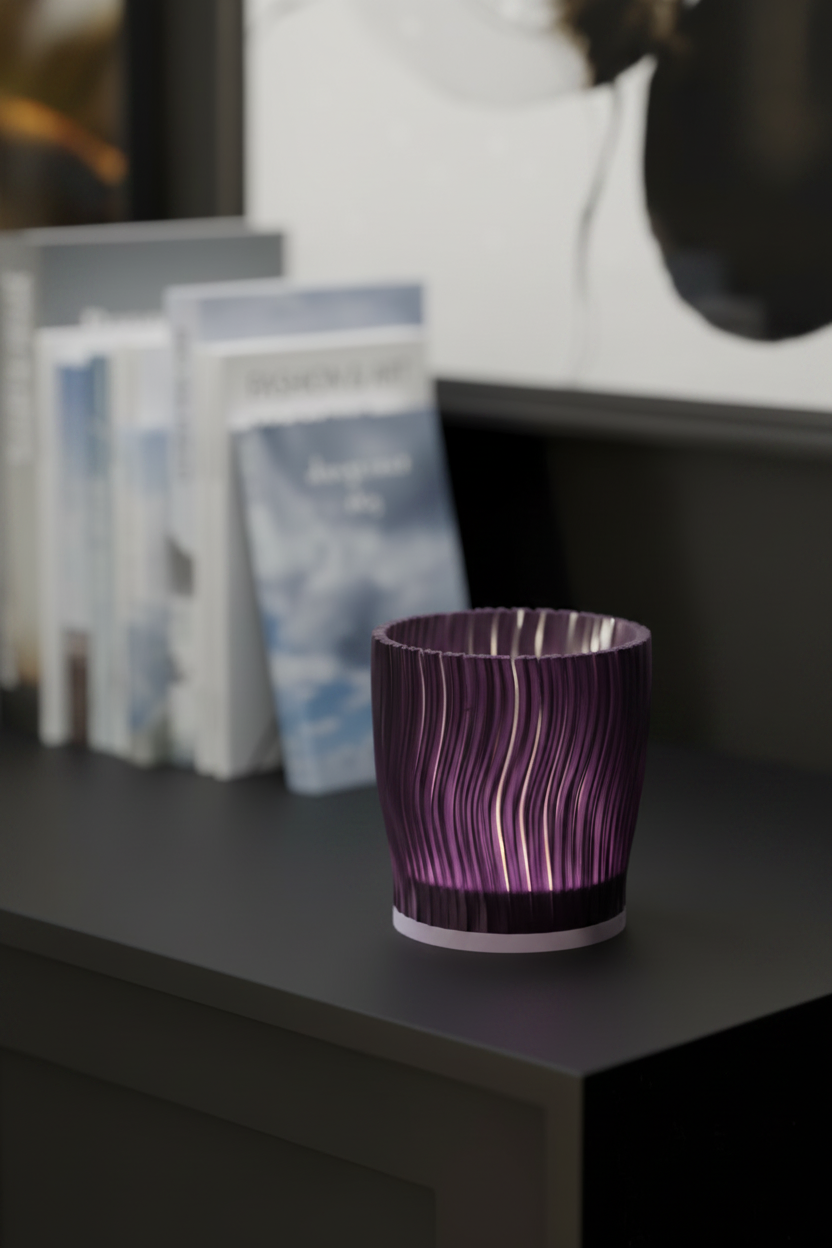 Ripple Edge Tealight Holder translucent deep purple vertical wave-ripple texture warm LED glow dark walnut shelf moody reading nook raking side light dramatic atmosphere