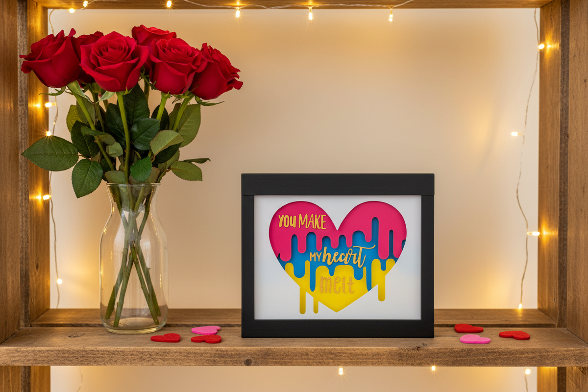 You Make My Heart Melt shadow box on shelf with Valentine's roses and fairy lights