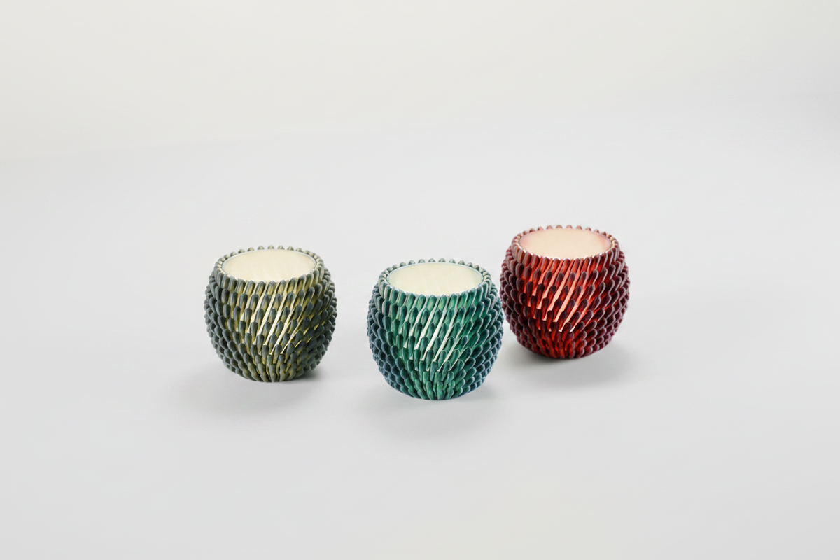 Three sea anemone holders in a row all glowing - lifestyle
