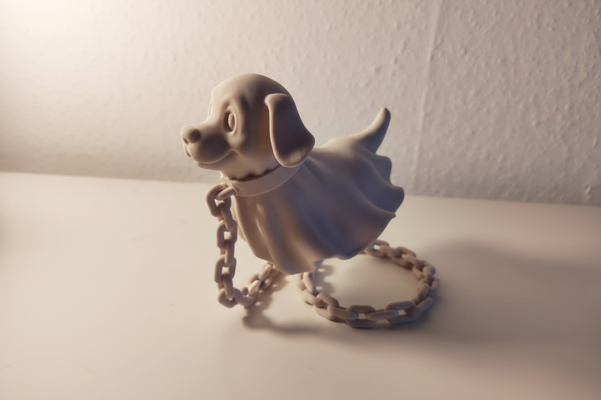 Ghost dog miniature figurine unpainted resin side profile full three dimensional depth sad puppy face floating ghost body heavy chain neutral studio raking side light landscape editorial