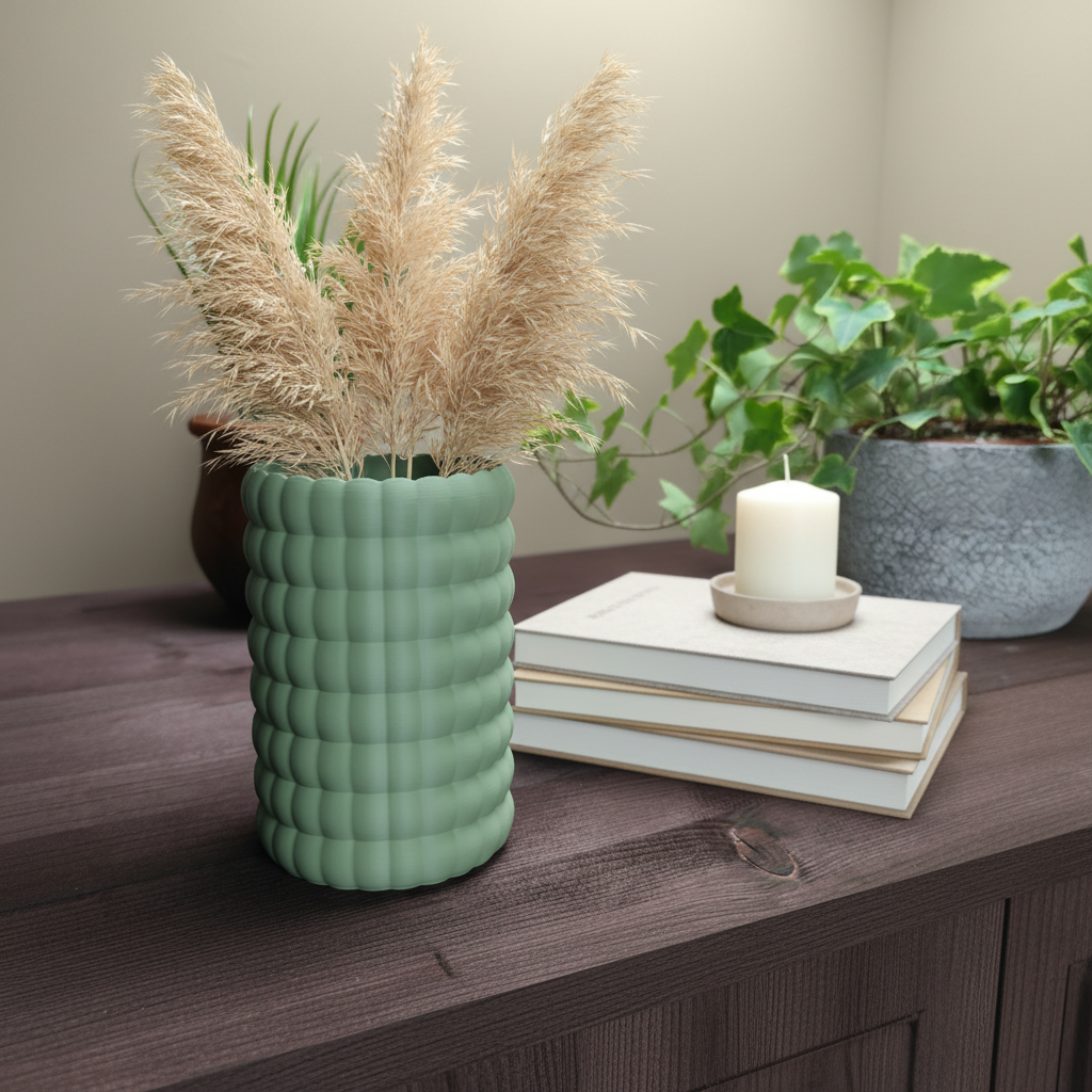 Sage green Bubble Bloom vase with dried pampas grass on a wooden sideboard in a Scandinavian interior