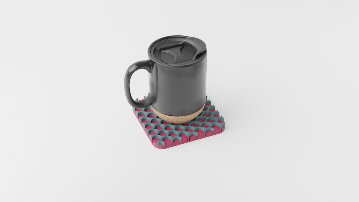 Close-up of a black mug resting on the Triple Interlocking Coaster Set
