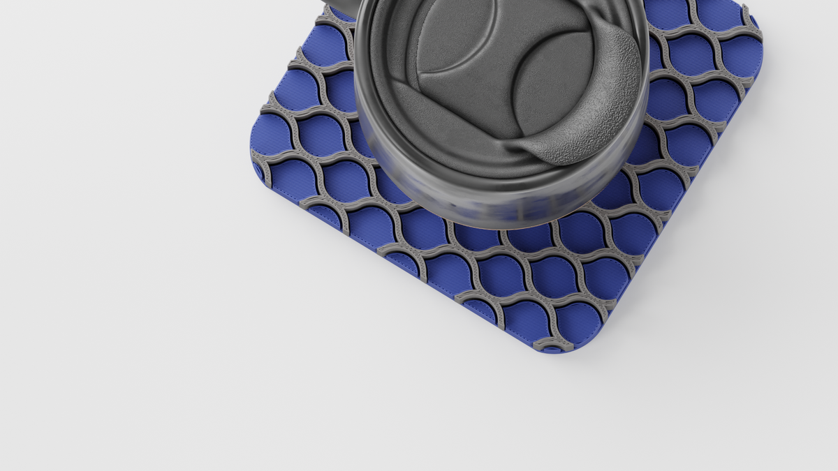 Top view of a mug on the patterned Triple Interlocking Coaster Set