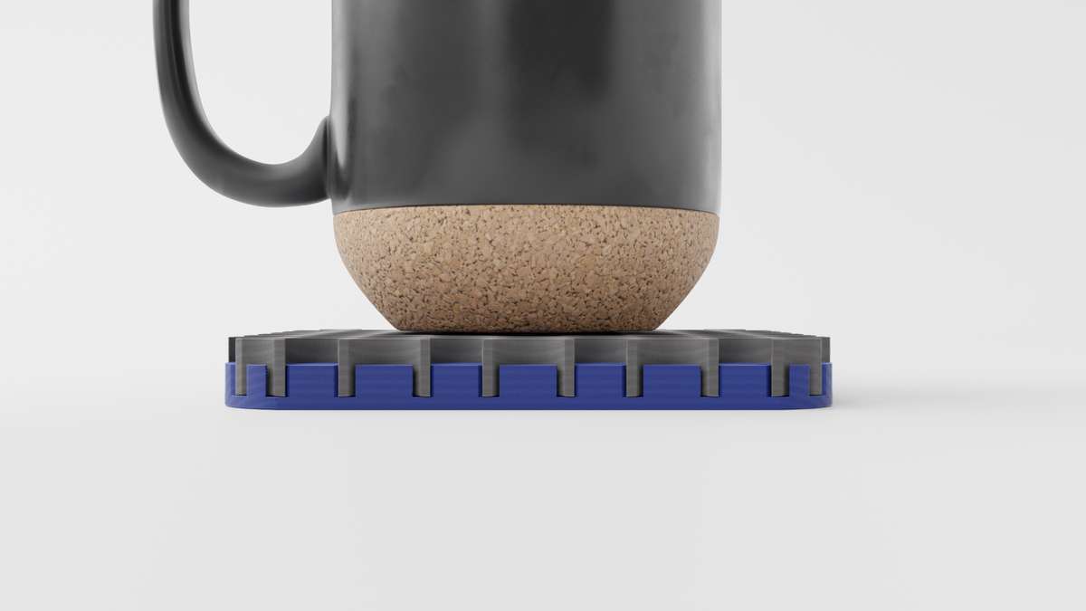 Side view showing a mug balanced on the Triple Interlocking Coaster Set