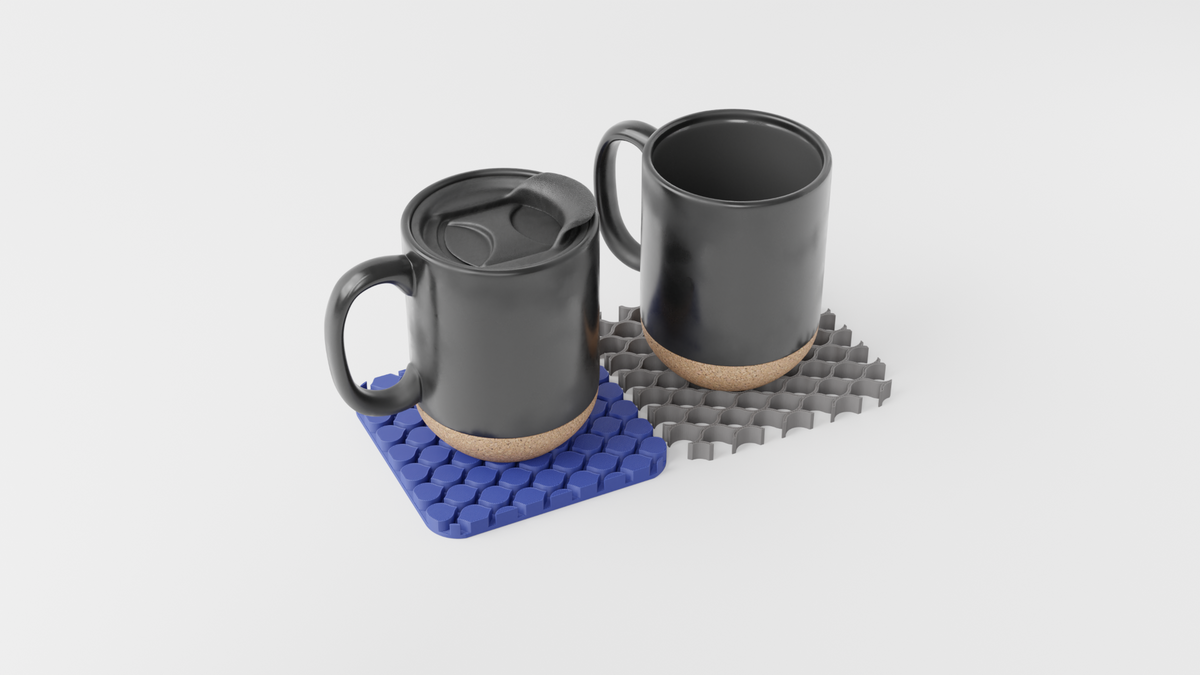 Two mugs placed on separate pieces of the Triple Interlocking Coaster Set