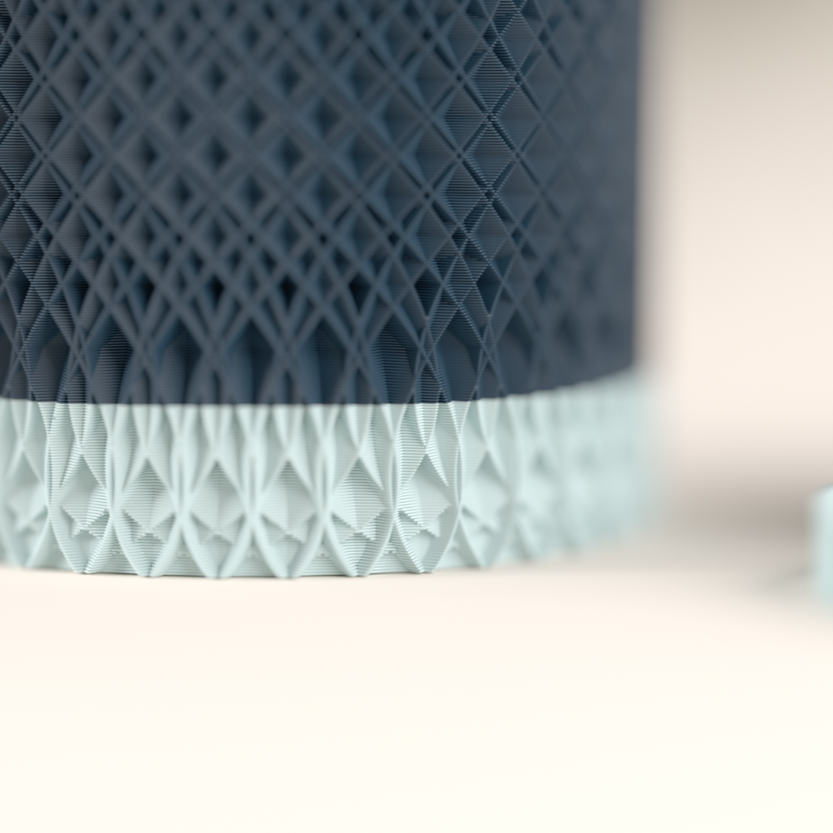 Geometric Textured Plant Pot dark navy diamond lattice cylindrical body pale ice-blue diamond lattice detachable drainage saucer base close up macro detail cream surface showing lattice facets and base drainage platform