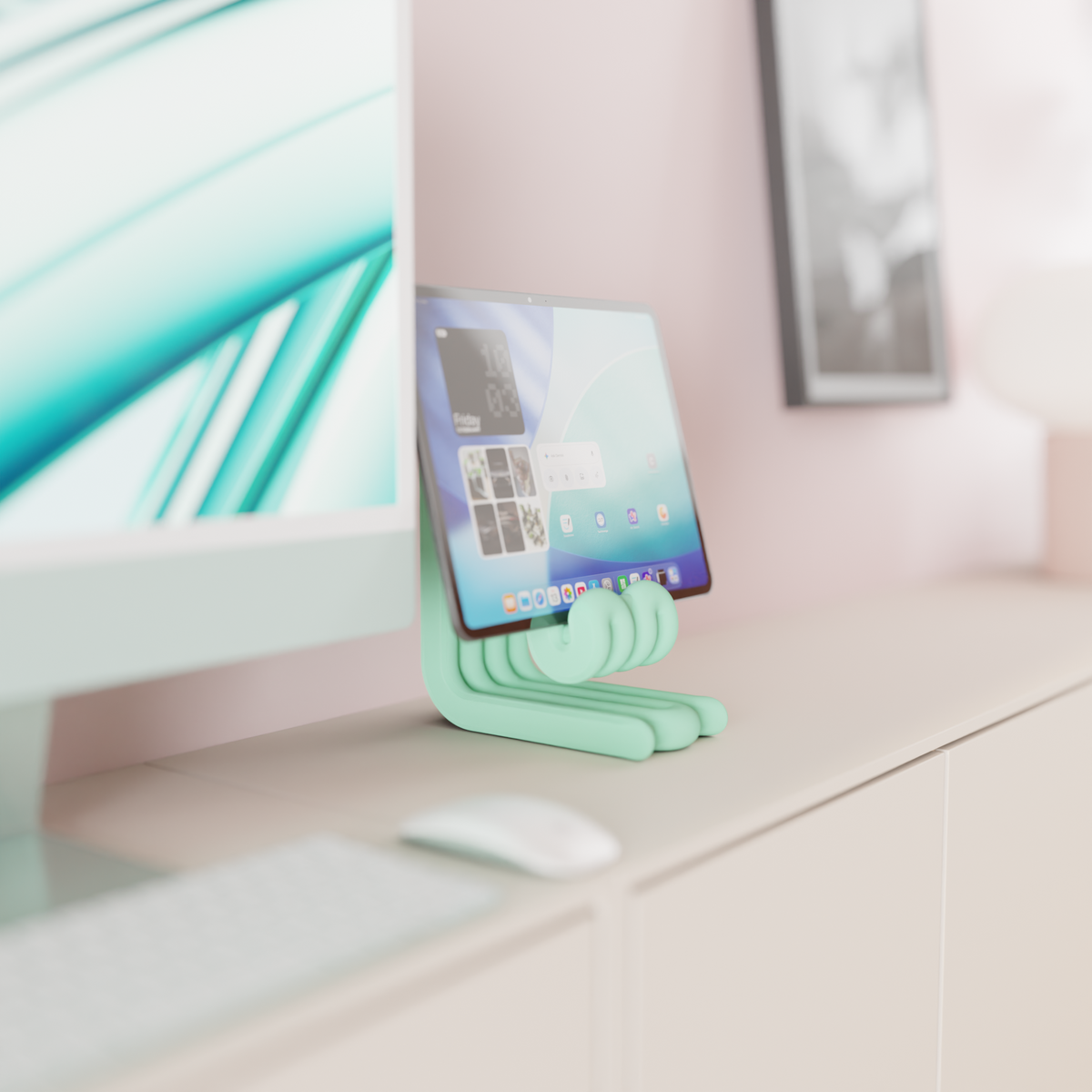 Wibble iPad Stand mint green floating holding iPad surrounded by teal and white geometric shapes cubes spheres pink background render