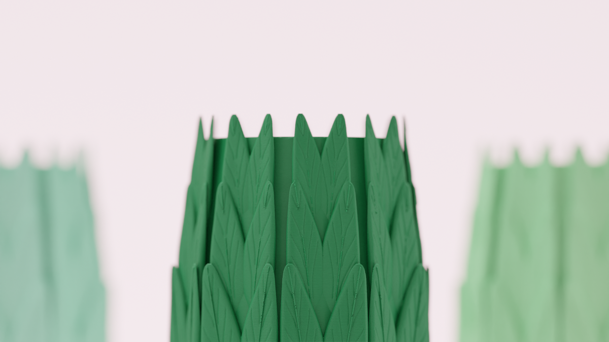 Top view showing the deep cylindrical opening of a green leaf organiser