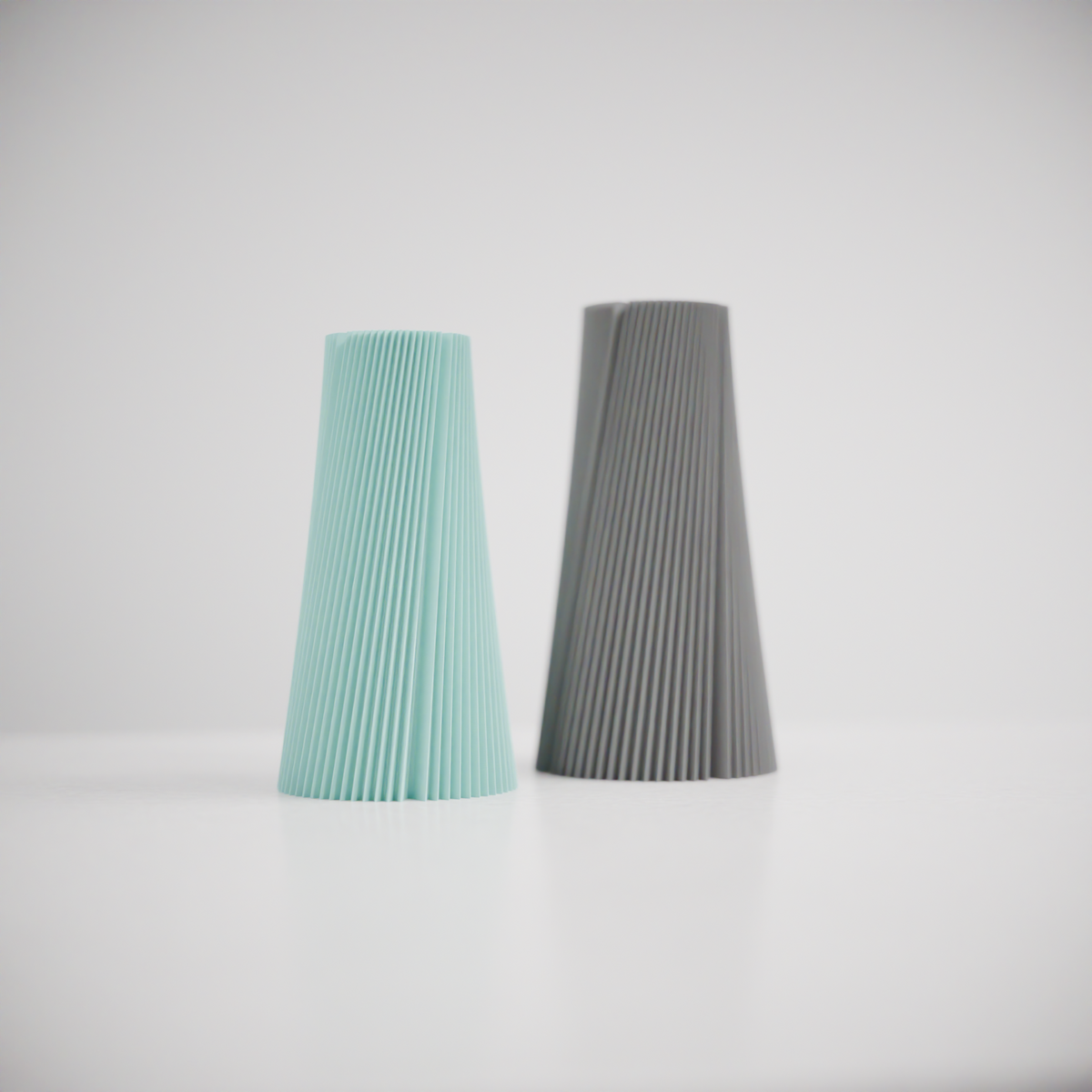 Pleated Cone Vase mint green tightly packed vertical pleats tapered cone plain background