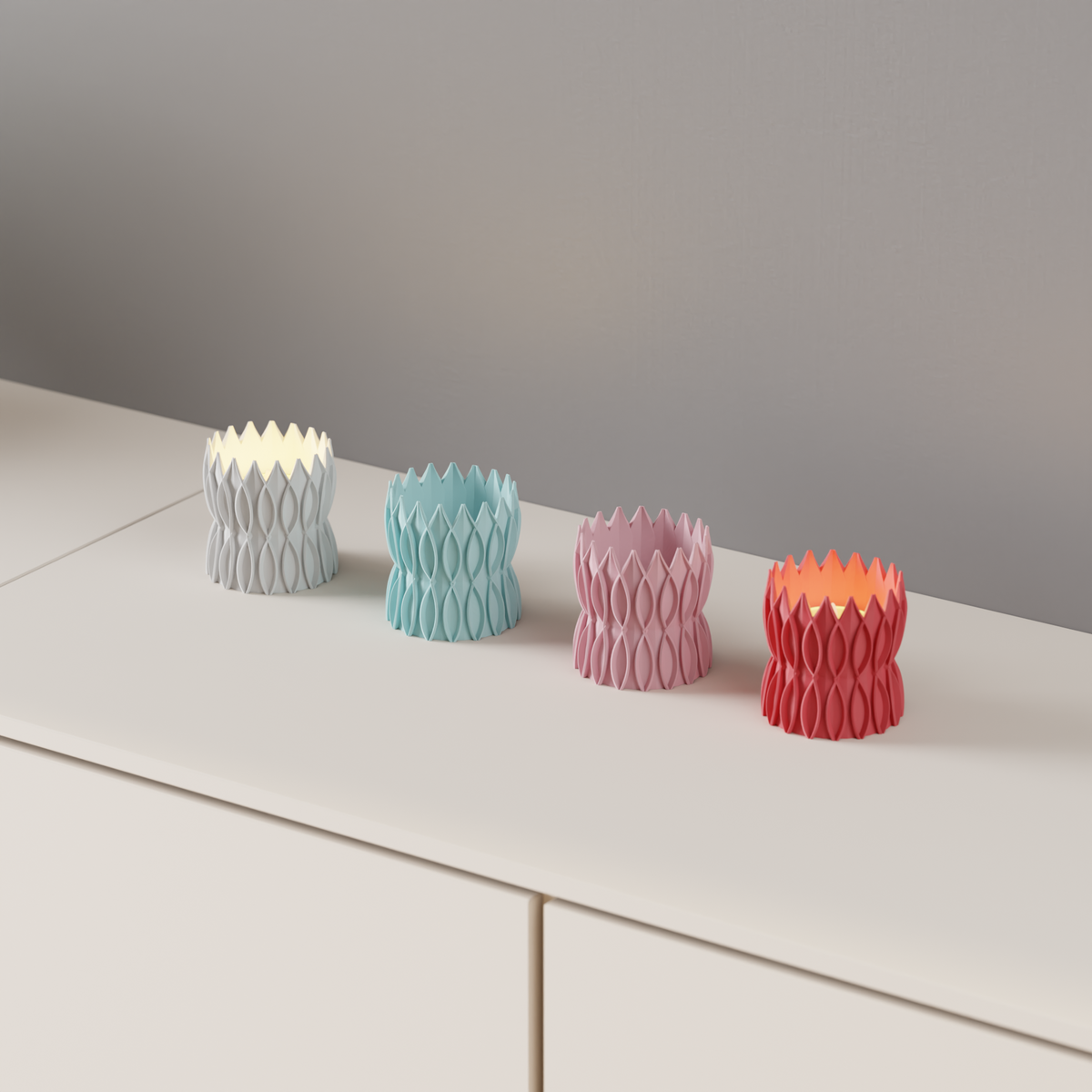 Krona Tealight Holder main product render white pink teal red four holders on white chest of drawers grey wall