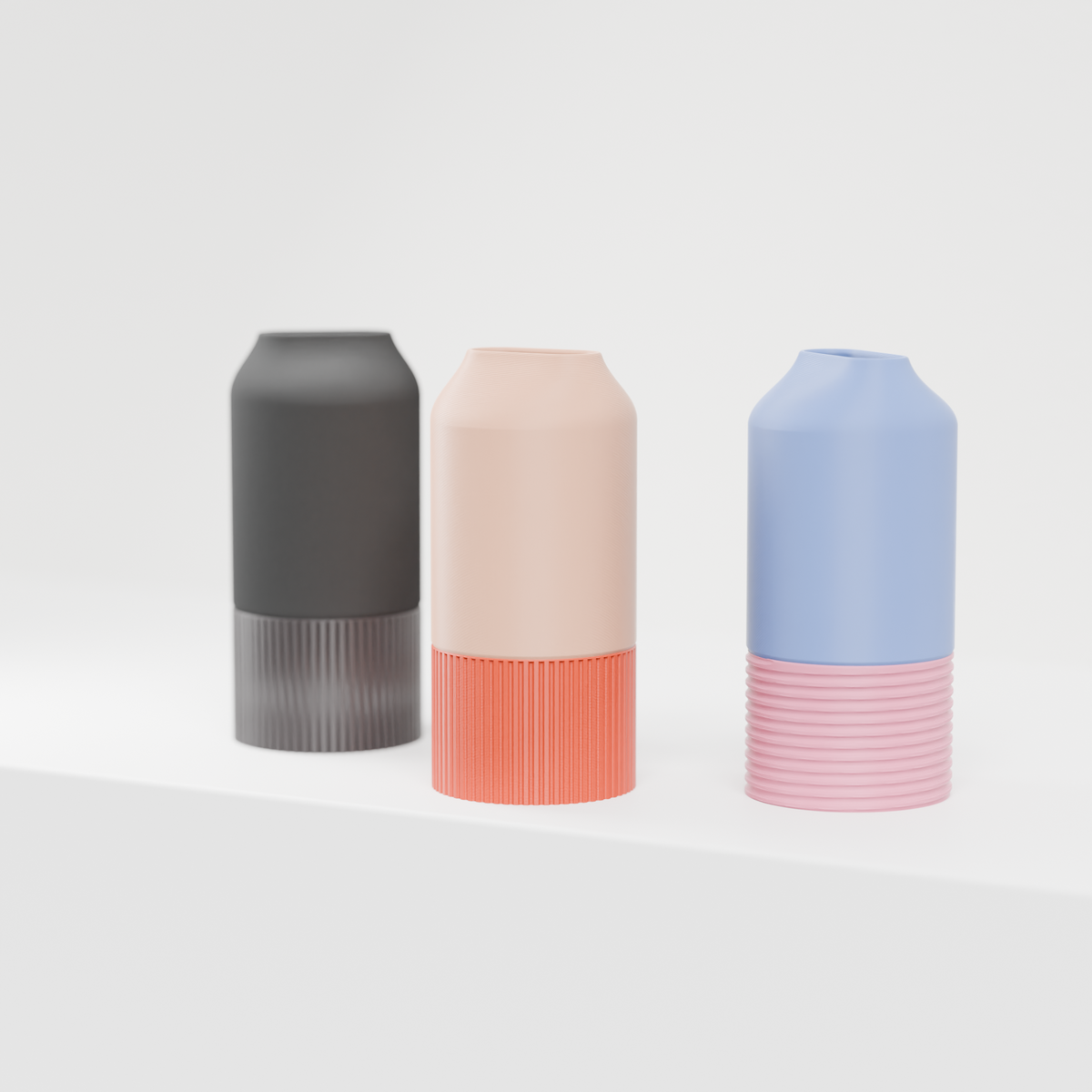 Elegant Two-Part Slot Vase grey peach blue trio lower angle clean white background