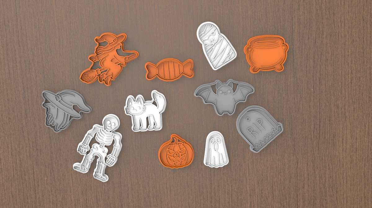 Halloween cookie cutters in assorted colours displayed together