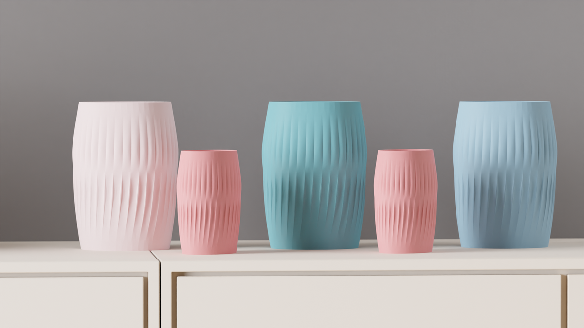 White, pink and blue Ripplied Barrel Vases arranged in a pastel display