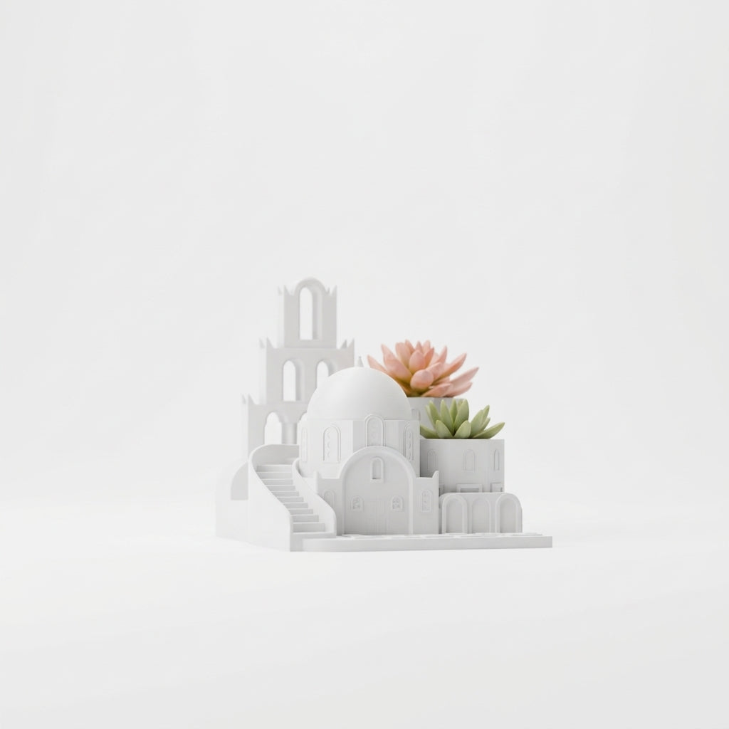 Santorini Oasis Succulent Planter white on dark sideboard books amber bottle warm candlelight