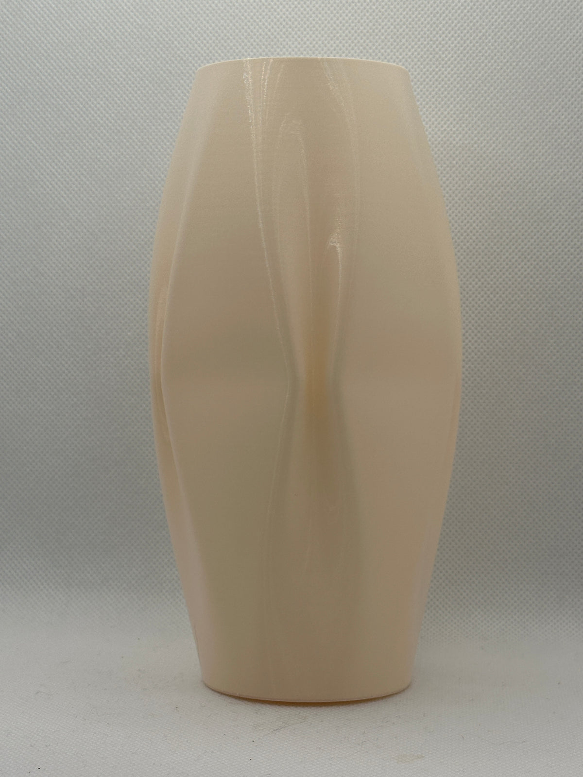 Quad ripple decorative vases in five colours on cream sideboard with framed art lifestyle shot
