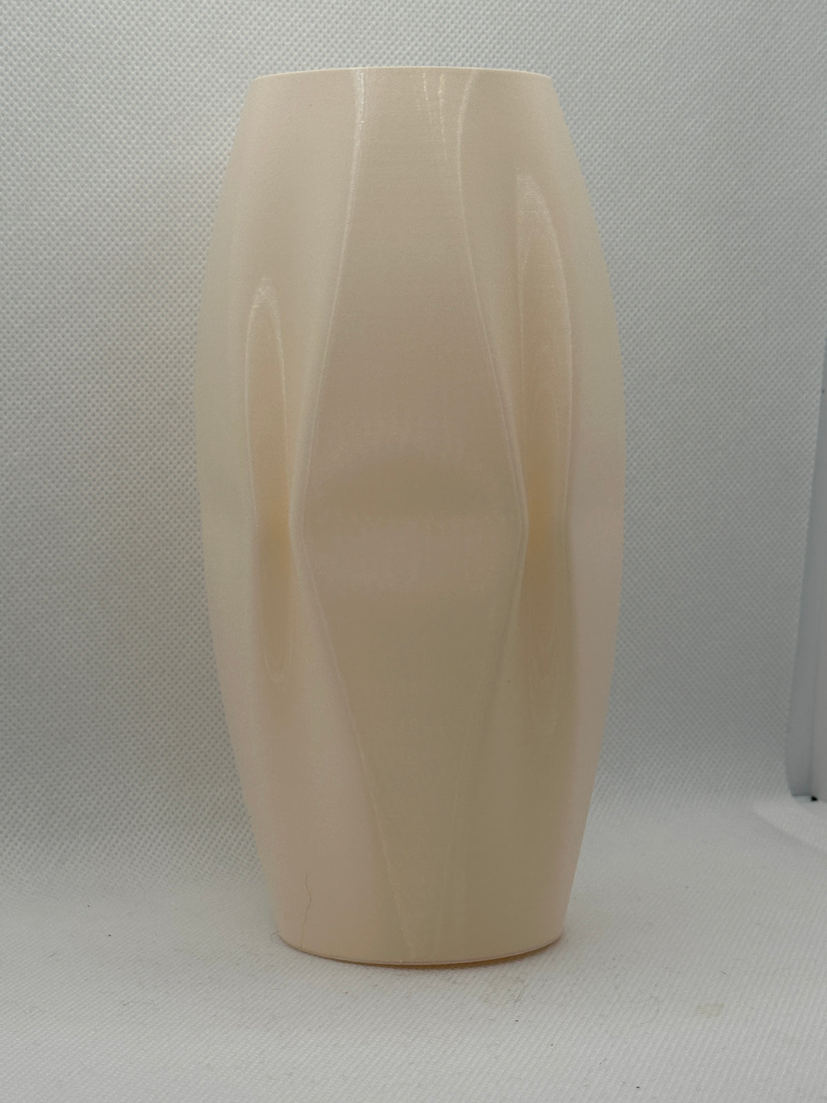 Quad ripple vases front view five colours on cream sideboard minimal interior