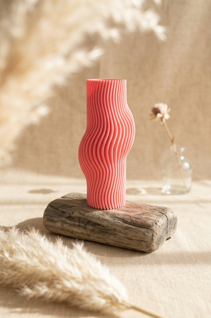 Elegant Ribbed Flow Vase pink three quarter view showing silhouette and form