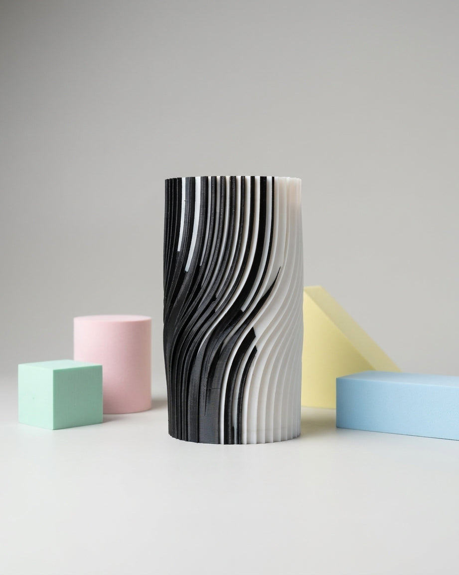 Top-down angled view of black and white vase