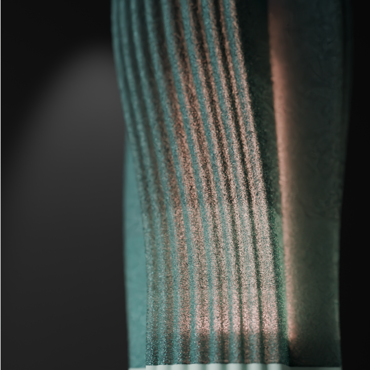 Swirl and Shine Desk Lamp teal angle view render showing swirling rib pattern and inner cylinder white background