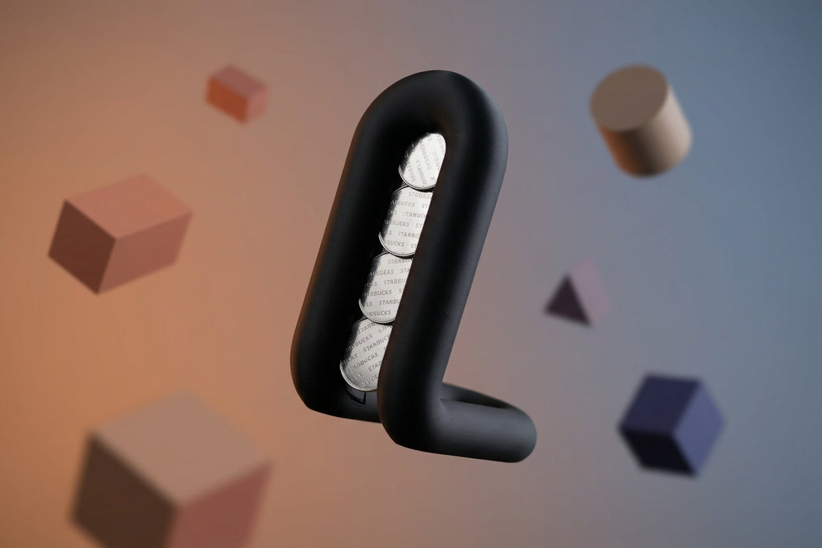 Wibble coffee pod holder render showing base loop and standing profile