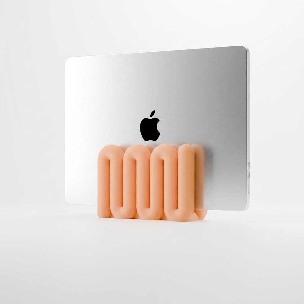 Wibble Vertical Laptop Stand - render lifestyle orange with MacBook white background