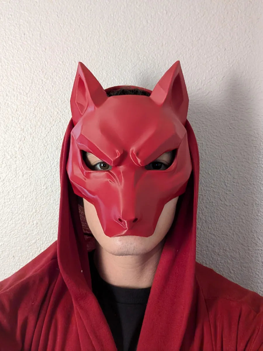 Red Kitsune Wolf Mask worn with a red hooded costume